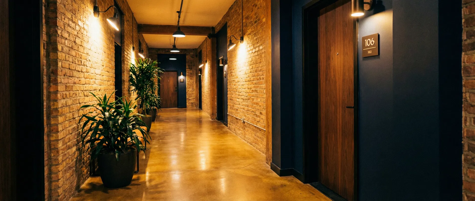 Altus Property Partners maintenance team in a well-maintained apartment hallway